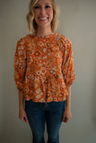 The Suzie Retro Peplum Top (Pumpkin)