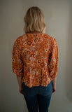 The Suzie Retro Peplum Top (Pumpkin)